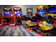 The game room is full of new arcade games with racing and transformers themes, fun for everyone at 505 Ocean Course Ave # 505, Davenport, FL 33896
