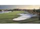 The expansive golf course features manicured greens, water features, and picturesque views at 505 Ocean Course Ave # 505, Davenport, FL 33896