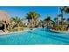 The lazy river is surrounded by lush tropical landscaping and sunny skies, ideal for relaxation at 505 Ocean Course Ave # 505, Davenport, FL 33896