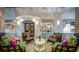 Well-appointed lobby area with decorative fish tanks and cozy, patterned seating at 505 Ocean Course Ave # 505, Davenport, FL 33896