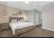 Warm and inviting main bedroom with decorative wall accents and hanging pendant lighting at 505 Ocean Course Ave # 505, Davenport, FL 33896