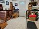 Bonus room with bookcases, a treadmill and rocking chair at 24008 Ermine Rd, Astor, FL 32102