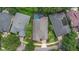 Aerial view of a single-Gathering home with a fenced-in pool and mature landscaping at 111 Asterbrooke Dr, Deland, FL 32724