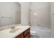 Standard bathroom with shower/tub combo with white tile surround and a single sink vanity at 111 Asterbrooke Dr, Deland, FL 32724