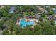 Aerial view of the community pool with a splash pad, and a picnic pavilion at 111 Asterbrooke Dr, Deland, FL 32724