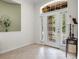 Bright foyer with decorative glass front door and transom window at 111 Asterbrooke Dr, Deland, FL 32724
