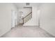 Hallway with staircase leading to upper level at 111 Asterbrooke Dr, Deland, FL 32724