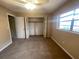 Spacious bedroom with ample closet space and neutral carpeting at 431 N Boston Ave # B, Deland, FL 32724