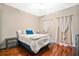 Bright bedroom with hardwood floors and window coverings at 227 Fort Florida Rd, Debary, FL 32713