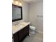 Clean bathroom with updated vanity and fixtures at 612 E Plymouth Ave, Deland, FL 32724