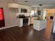 Modern kitchen with stainless steel appliances and island at 612 E Plymouth Ave, Deland, FL 32724