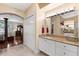 Bathroom with a decorative countertop, tile flooring, and a view to the pool at 3428 Longleaf Rd, Ormond Beach, FL 32174