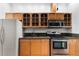 Kitchen featuring stainless steel appliances, granite countertops, and maple cabinets at 3428 Longleaf Rd, Ormond Beach, FL 32174