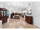 Spacious living area with tile flooring, decorative fixtures, and a formal dining space at 3428 Longleaf Rd, Ormond Beach, FL 32174