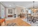 Elegant dining area with hardwood floors, rustic furniture, and a chandelier at 450 W Delaware Ave, Lake Helen, FL 32744