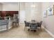 Bright breakfast nook features tile floors, breakfast bar, and table with seating at 309 Chesham St, Ormond Beach, FL 32174