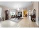 Formal dining area featuring tile floors, chandelier, and ornate furnishings at 309 Chesham St, Ormond Beach, FL 32174