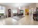 Formal dining room with neutral walls, chandelier, and beautiful furnishings at 309 Chesham St, Ormond Beach, FL 32174