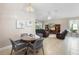 Inviting living space features dining area, sitting area, and neutral color palette at 309 Chesham St, Ormond Beach, FL 32174