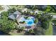Aerial view of community pool with lush landscaping and comfortable lounge areas at 309 Chesham St, Ormond Beach, FL 32174