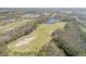 Aerial view of golf course near residential area at 341 Perfect Dr, Daytona Beach, FL 32124