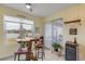 Kitchen breakfast nook with lake view, wooden table and barstools at 341 Perfect Dr, Daytona Beach, FL 32124