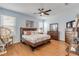 Spacious main bedroom with wood floors and a large bed at 341 Perfect Dr, Daytona Beach, FL 32124