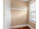 Bedroom closet featuring a wall-mounted clothes rod and a window providing natural light at 724 N Oleander Ave, Daytona Beach, FL 32118