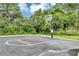 Outdoor basketball court surrounded by trees at 257 Ancona Ave, Debary, FL 32713