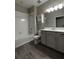 Clean bathroom, featuring a bathtub and modern vanity at 257 Ancona Ave, Debary, FL 32713