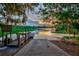 Serene lakeside dock at sunset with no wake zone at 257 Ancona Ave, Debary, FL 32713