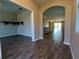 Bright and airy entryway leading to the living area and kitchen at 257 Ancona Ave, Debary, FL 32713