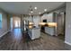 Modern kitchen featuring an island and stainless steel appliances at 257 Ancona Ave, Debary, FL 32713