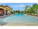 Inviting community pool with lounge chairs at 257 Ancona Ave, Debary, FL 32713