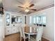 Charming dining room featuring a built in hutch, and bright light from large windows at 824 Silver Oak Ave, The Villages, FL 32159