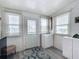 Welcoming front entrance with ample natural light and storage at 824 Silver Oak Ave, The Villages, FL 32159