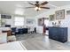 Functional home office with built-in desk, filing cabinets, and a comfortable workspace at 824 Silver Oak Ave, The Villages, FL 32159