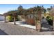 Lush patio area with pergola, bar and gravel landscaping at 3435 Arabesque Dr, Deland, FL 32724