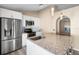 Modern kitchen with stainless steel appliances and granite countertops at 3435 Arabesque Dr, Deland, FL 32724