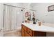 Bathroom with vanity and shower/tub combo at 210 Brookgreen Way, Deland, FL 32724