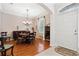 Formal dining room featuring a round table and hardwood floors at 210 Brookgreen Way, Deland, FL 32724