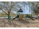 playground by the lake with slides and climbing structures at 210 Brookgreen Way, Deland, FL 32724