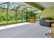 Large screened-in porch area with plenty of room for outdoor living and entertaining at 317 Nowell Loop, Deland, FL 32724
