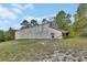 Rustic barn with weathered siding, adding character and potential for storage or hobby space at 1440 Arroyo Vista Dr, Deland, FL 32724