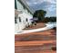 Outdoor deck with dining area, perfect for enjoying meals with a view of the pool at 1440 Arroyo Vista Dr, Deland, FL 32724
