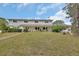 Inviting home with a brick walkway and large front yard with plenty of curb appeal at 1440 Arroyo Vista Dr, Deland, FL 32724