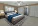 Spacious main bedroom featuring a plush bed, soft carpet, and natural light, creating a relaxing retreat at 1440 Arroyo Vista Dr, Deland, FL 32724