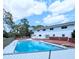 Inviting pool with a spacious deck, perfect for outdoor relaxation and entertaining at 1440 Arroyo Vista Dr, Deland, FL 32724