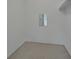 Compact room with neutral carpet and a simple wall mirror at 1440 Arroyo Vista Dr, Deland, FL 32724