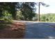 Street view of neighborhood road with a chain link fence at 1440 Arroyo Vista Dr, Deland, FL 32724